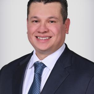 Adrian J. Mora, MD