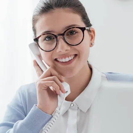 Person on phone smiling.